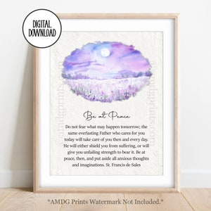 May include: A watercolor painting of a purple and blue landscape with a full moon in the sky. The text "Be at Peace" is written in black lettering below the image. The text continues with a quote from St. Francis de Sales: "Do not fear what may happen tomorrow; the same everlasting Father who cares for you today will take care of you then and every day. He will either shield you from suffering, or will give you unfailing strength to bear it. Be at peace, then, and put aside all anxious thoughts and imaginations. St. Francis de Sales."