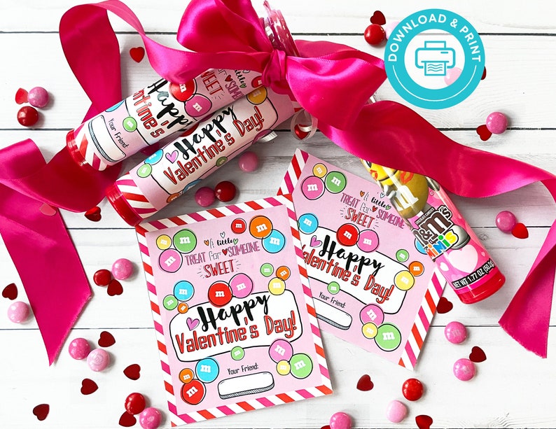 May include: Printable Valentine's Day cards with a pink and white background featuring colorful M&M's and the text "Happy Valentine's Day!"  A small treat bag filled with M&M's is also included.