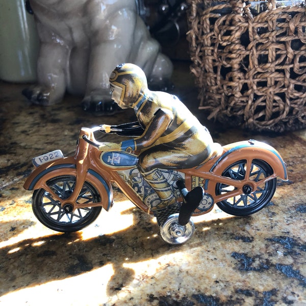 Tin wind up toy motorcycle reproduction of 1932