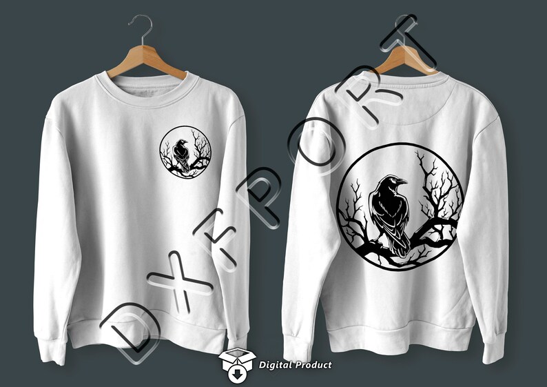 Puede incluir: Sudadera blanca con un dise&ntilde;o de silueta de cuervo negro en la espalda. El cuervo est&aacute; posado en una rama dentro de un c&iacute;rculo.