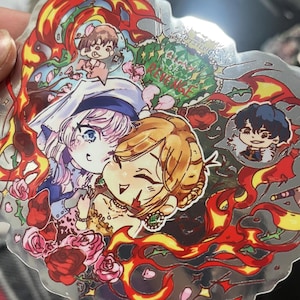May include: A silver sticker featuring anime-style illustrations of two characters embracing, surrounded by flames and roses. The sticker includes additional small character illustrations and the text "GLOW OF REVENGE".