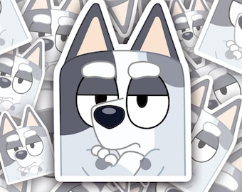May include: A sticker of a cartoon dog with a white and gray fur pattern. The dog has a serious expression with its arms crossed and a frown on its face.