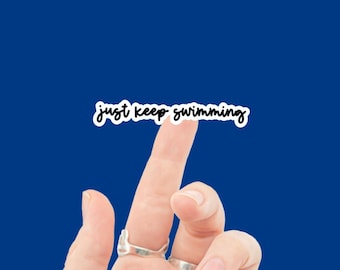 Just Keep Swimming Sticker available in Matte, Glossy, or Holographic | Cursive Stickers | Motivational Stickers