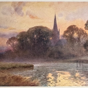 May include: A watercolour painting depicting a church spire silhouetted against a sunset sky. The church is surrounded by trees and a river with reflections of the sky on the water.