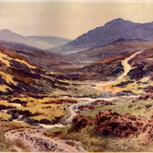 May include: A watercolour painting depicting a winding road leading through a valley with rolling hills and mountains in the background. The sky is a light blue with a few clouds. The road is a light brown colour and the hills are a mix of green and brown.