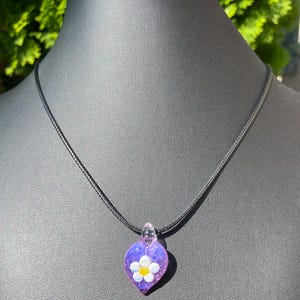 Heart Glass pendant with a mini flower on top