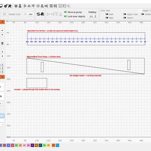 May include: A digital interface for laser cutting software displaying a grid workspace with three distinct geometric shapes. The layout includes a long rectangle with tick marks, a large right-angled triangle, and a smaller rectangle, all featuring red text annotations.