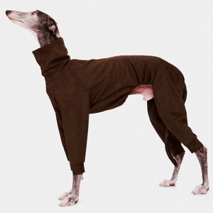 May include: A brown dog jumpsuit with a high neck and long sleeves. The jumpsuit is made of a soft, comfortable fabric and is perfect for keeping your dog warm in the winter.