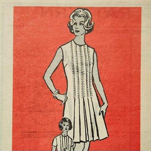 May include: A black and white illustration of a woman wearing a sleeveless dress with vertical pleats. The dress has a high neckline and a fitted bodice. The woman has short, blonde hair and is wearing earrings.