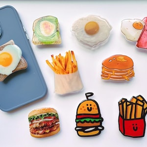 Irresistible Food-Themed Phone Grips | Burger, Fries, Breakfast & More | Fun, Universal Fit Phone Holders - Grab Yours Today!