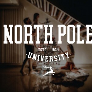 May include: A white logo with the text "NORTH POLE UNIVERSITY" and "ESTD. 1824" in a vintage style font. A white reindeer silhouette is below the text.