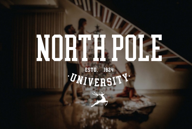 May include: A white logo with the text "NORTH POLE UNIVERSITY" and "ESTD. 1824" in a vintage style font. A white reindeer silhouette is below the text.
