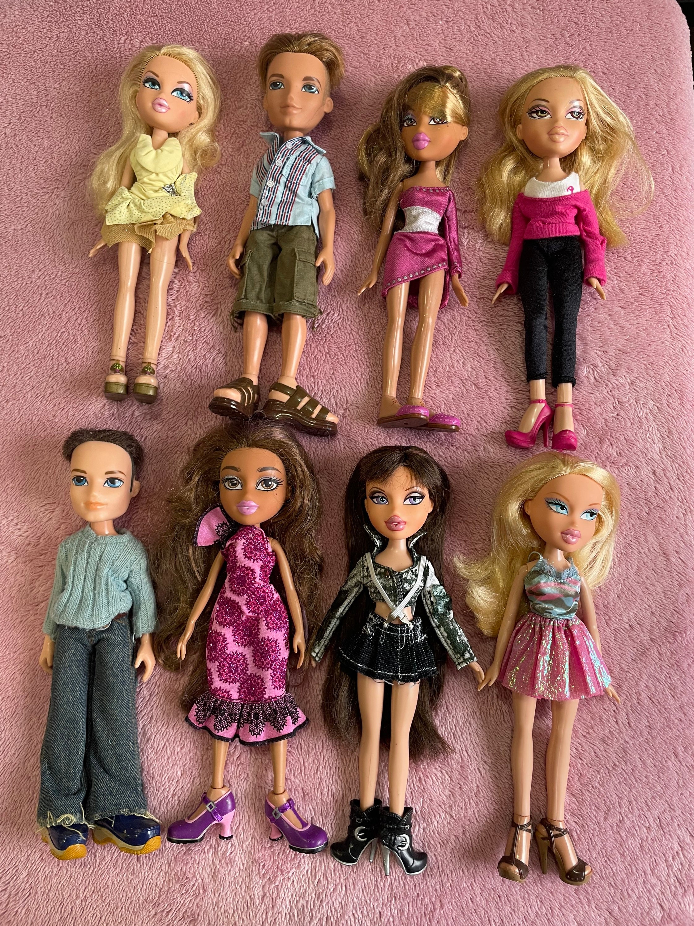 Bratz dolls and winx collaboration in y2k style with wings and sparkles on  Craiyon