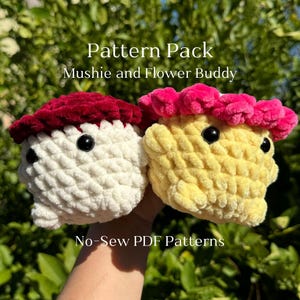 May include: A crochet pattern pack for making two plush toys: a white and red "Mushy" and a yellow and pink "Flower Buddy". The pattern pack includes no-sew PDF patterns.