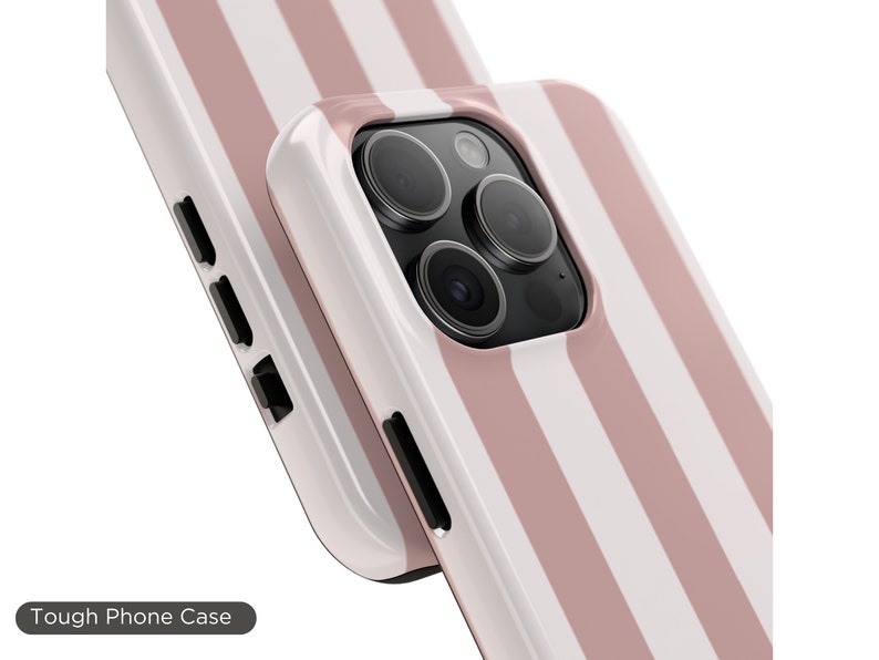 May include: A white and pink striped phone case with a camera cutout. The case is made of a tough material and is designed to protect your phone from scratches and drops. Tough Phone Case.