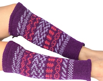 May include: A pair of purple knitted arm warmers with a pink and white geometric pattern.