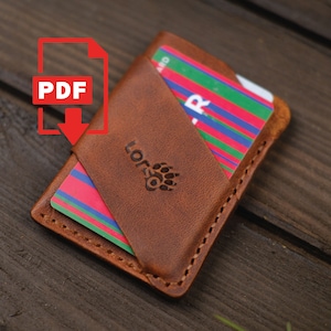 May include: A brown leather card holder with a bear paw logo and the word "LORSO" embossed on the front. The wallet holds several colorful credit cards. The PDF icon is in the upper left corner.