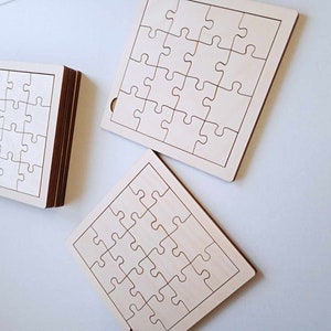 May include: Three unfinished wooden jigsaw puzzles, each with 16 pieces. The puzzles are square shaped and have a light wood colour.
