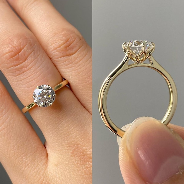 Precioso anillo de compromiso de moissanita de talla redonda en oro rosa de 14 quilates con diamantes CZ: ideal para aniversarios y bodas.