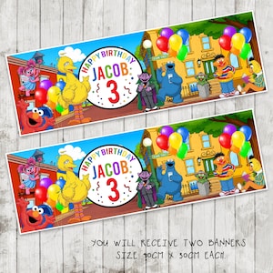 May include: Two rectangular birthday banners featuring Sesame Street characters including Big Bird, Elmo, Cookie Monster, and Count von Count. The text reads Happy Birthday Jacob 3. Each banner measures 90 cm by 30 cm, displayed against a wooden background.
