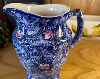 A "Ringtons Tea" Milk Jug in Bue and Chintz