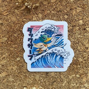 Pegatina de pato surfeando en la ola de Kanagawa Pegatina de pato Pegatina de ola de Kanagawa Pegatina de pájaro acuático Pegatina de dibujos animados Pegatina de libros Pegatina de Kindle