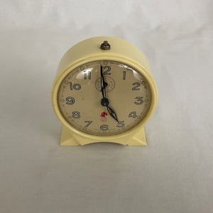 Antique mechanical alarm clock from the 50s, vintage SMI brand, vintage table clock with antique alarm function