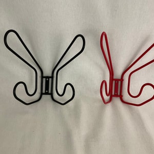 pair of red and black coat hooks model Fran by IKEA 1980 vintage old French antique