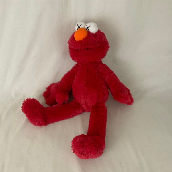 Peluche Elmo Kaws Sesame Street UNIQLO