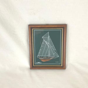 Small framed lithograph of half the hull of Pen Duick 1, Eric Tabarly's first boat, vintage shabby chic