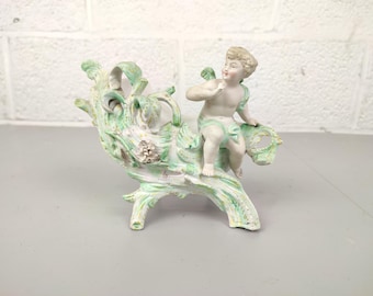 Antique flower pot / jardinière with cherub biscuit