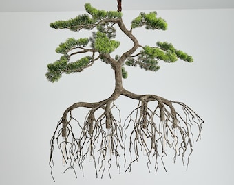 Lampadario scultoreo con radici di rami e foglie artificiali