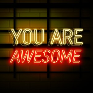 May include: Neon sign on a brick wall that reads "You are awesome" in yellow and red.