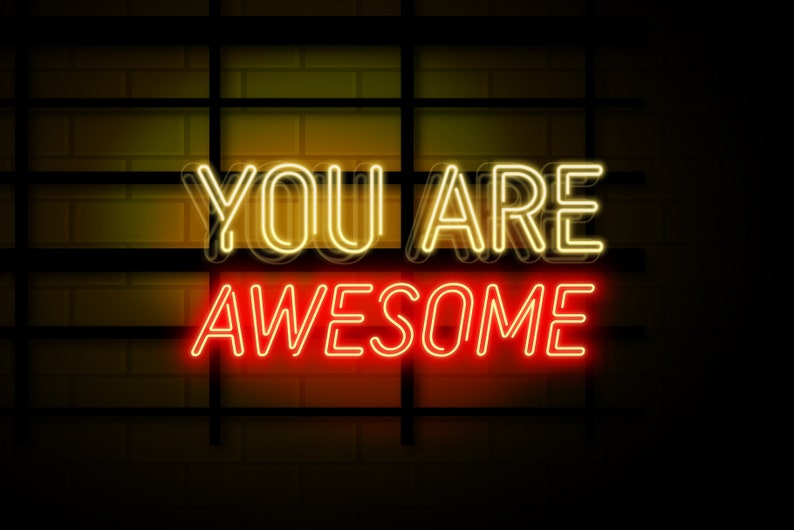 May include: Neon sign on a brick wall that reads "You are awesome" in yellow and red.