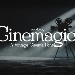 May include: A vintage-style font called "Cinemagic" with 28 ligatures. The font is displayed in white against a dark background with a spotlight shining on a vintage film camera.