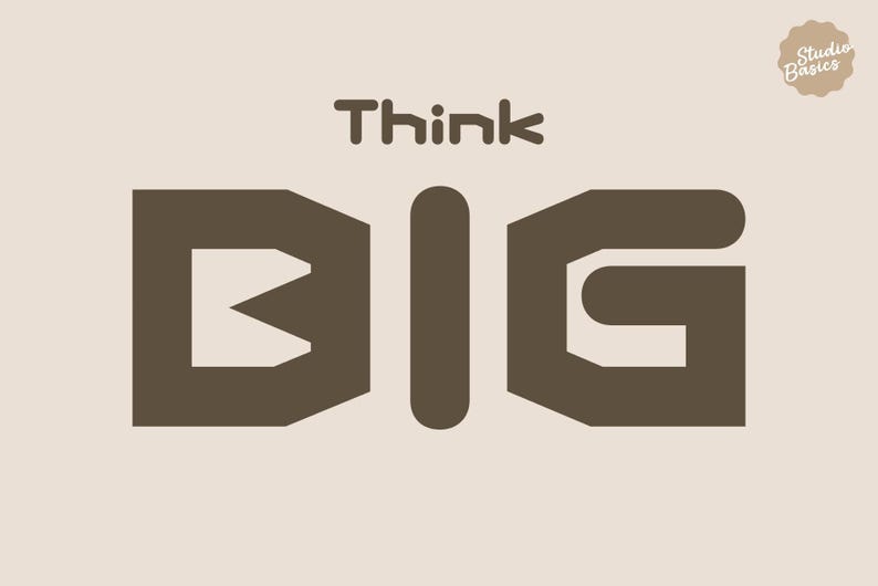 May include: A graphic design with the words "Think BIG" in a bold, sans-serif font. The word "BIG" is in a large, blocky style, with "Think" above it. The background is a neutral beige colour. The Studio Basics logo is in the top right.