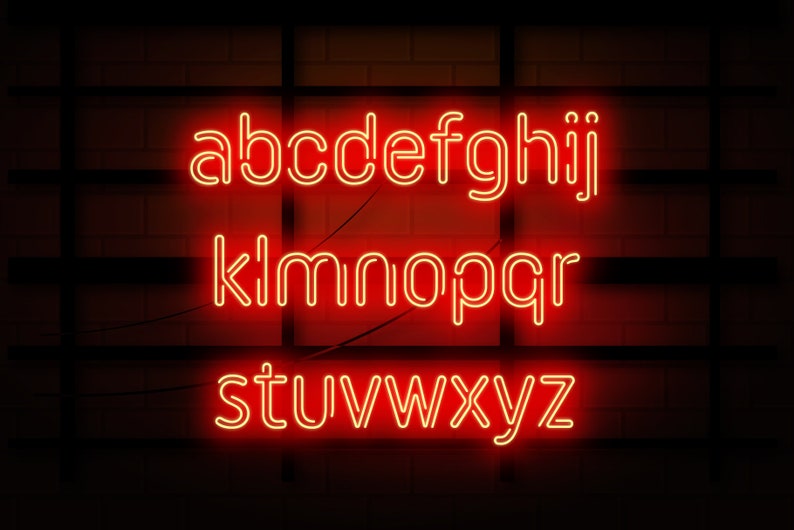 May include: Red neon letters spelling out the alphabet on a brick wall background.