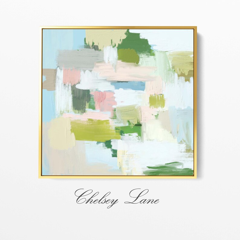 May include: Abstract art print in a gold frame. The artwork features brushstrokes in shades of green, pink, blue, and beige. The text "Chelsey Lane" is at the bottom of the frame.