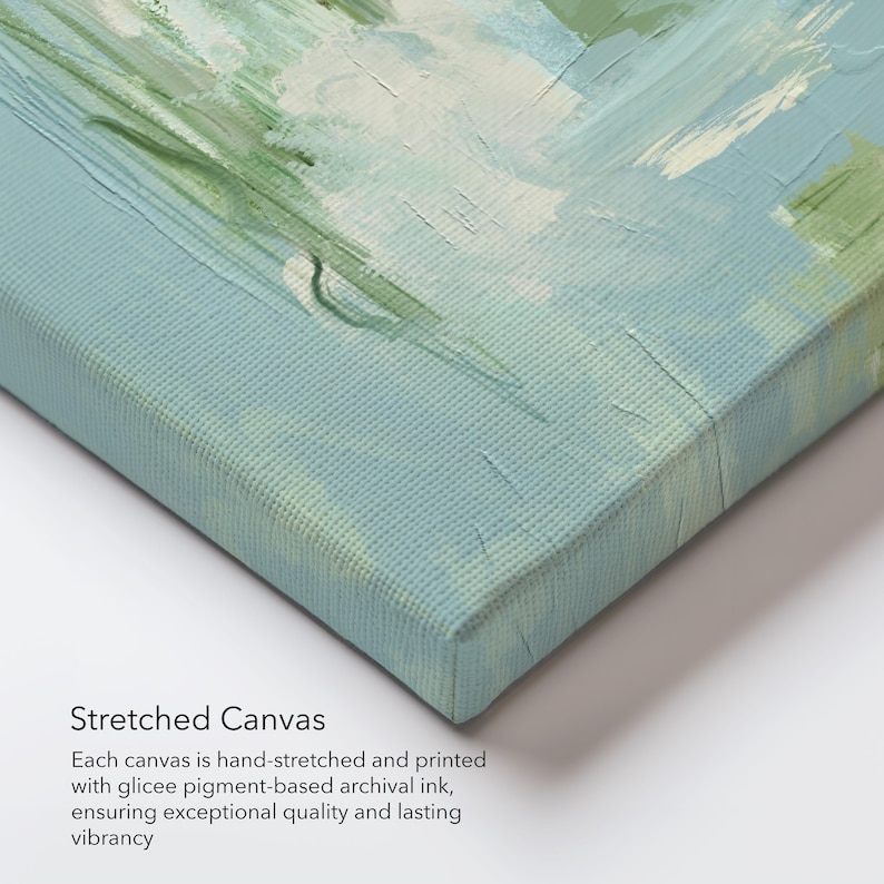 May include: A corner view of a stretched canvas art print. The artwork features abstract brushstrokes in shades of blue, green, and white. The canvas is hand-stretched and printed with archival ink, ensuring quality and vibrancy. The text "Stretched Canvas" is visible.