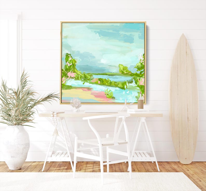 May include: Abstract landscape painting with a light blue, green, and pink color scheme. The painting depicts a scene with water, trees, and a sandy beach.