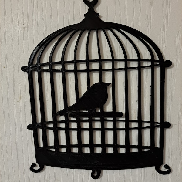 Oiseau dans une cage, décoration murale