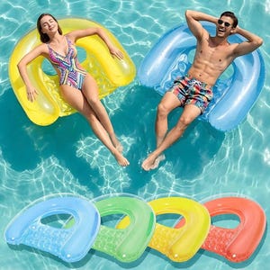 May include: People relaxing on inflatable pool floats in a pool. The floats are in yellow and blue. Additional floats in blue, green, yellow, and red are shown below. The water is clear and blue.