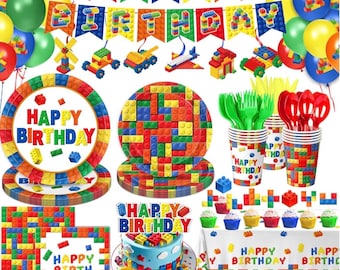 May include: A colorful birthday party set featuring a banner, plates, cups, cutlery, balloons, and a cake, all decorated with a building block theme. The words "HAPPY BIRTHDAY" are prominently displayed on various items.