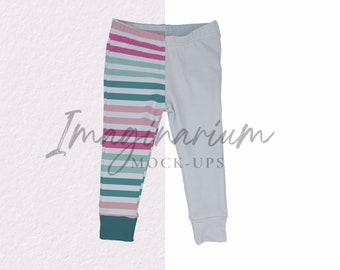 May include: A pair of children's leggings, one side striped with pink, teal, and white horizontal bands, the other side solid white. The leggings have a teal cuff at the ankle and a white waistband. The image has the text "Imaginarium MOCK-UPS".