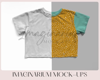 May include: Mockup of an oversized white tee shirt with a yellow and white polka dot pattern on the right side and a teal blue sleeve. The text "IMAGINARIUM MOCK-UPS" is at the bottom of the image. The text "Pattern: Oversized Tee by Lowland Kids" is below the text "IMAGINARIUM MOCK-UPS". The text "Purchase Includes PSD & Procreate Files with: Separate Layers for each part of the garment Changeable Background" is below the text "Pattern: Oversized Tee by Lowland Kids".