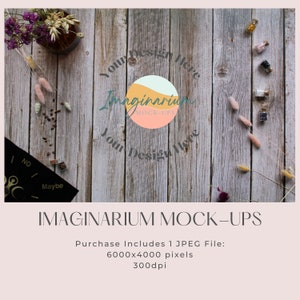 May include: A rustic wooden background with dried flowers, small bottles, and a black and white sign that says "Maybe" and "No". The text "Your Design Here" and "Imaginarium Mock-Ups" is superimposed on the image.
