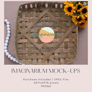 May include: A woven basket with a brown and white design, featuring a circle with the text "Imaginarium Mock-Ups" and the words "Your Design Here" on either side. The basket is surrounded by a white beaded garland and a bouquet of yellow sunflowers.