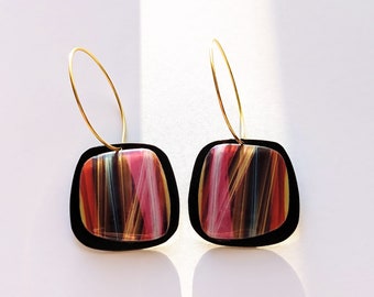 Radiant Hues.Unleash Your Bold side with these vibrant earrings.