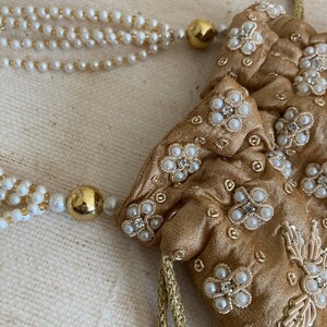 Simran Bronze Pearl Potli Bag (ST810)