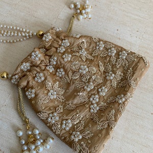 Simran Bronze Pearl Potli Bag (ST810)